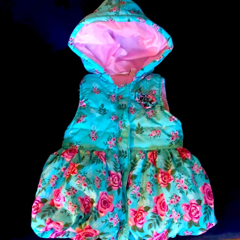 Girl’s turquoise peplum vest